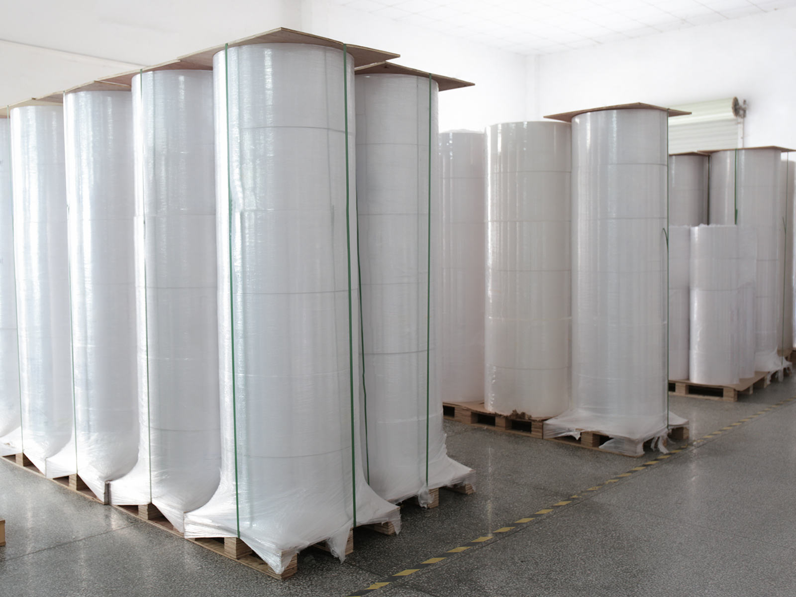 Self-adhesive large roll